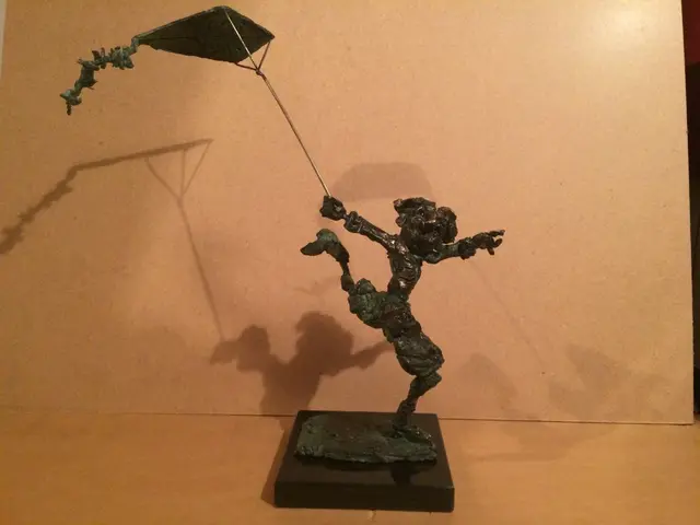 Kiteflying – bronze sculpture by Ernő Tóth